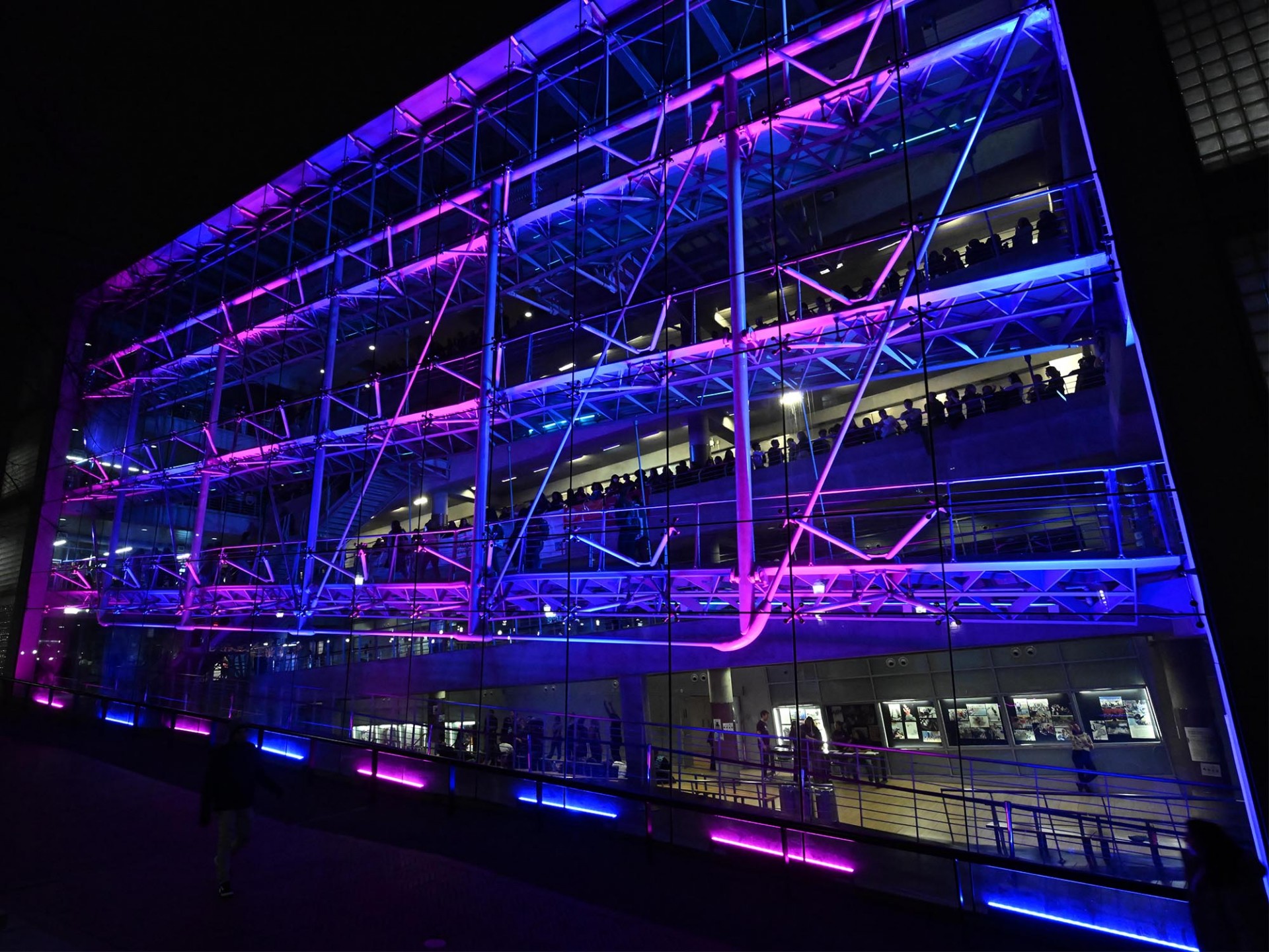 Lerner Hall Exterior lit for Glass House Rocks, photo taken at an angle