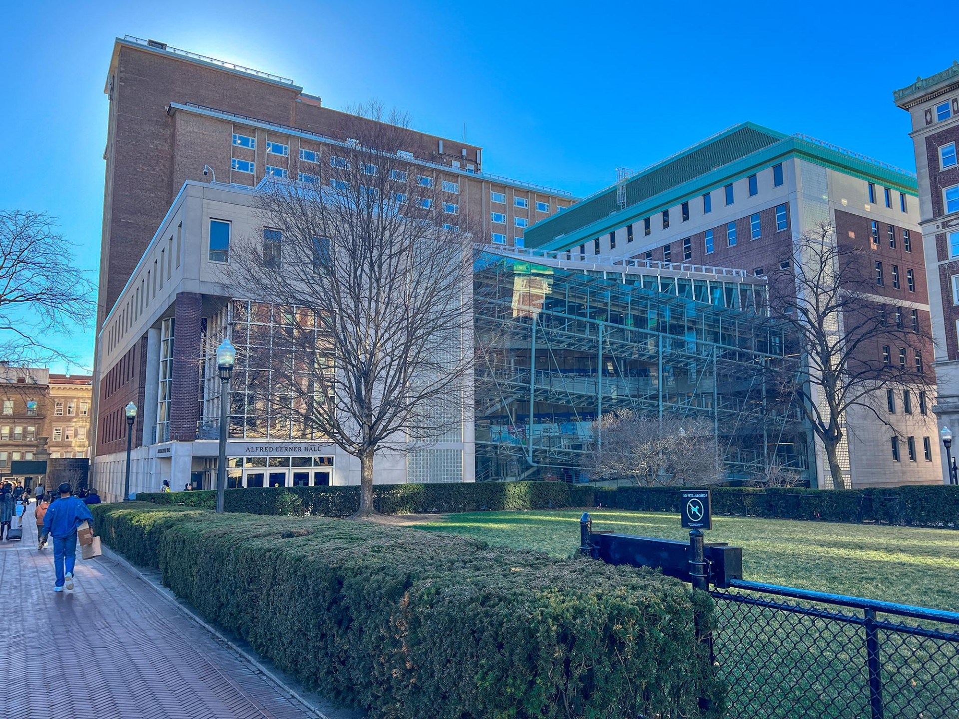 Lerner Hall on a bright day with students walking around