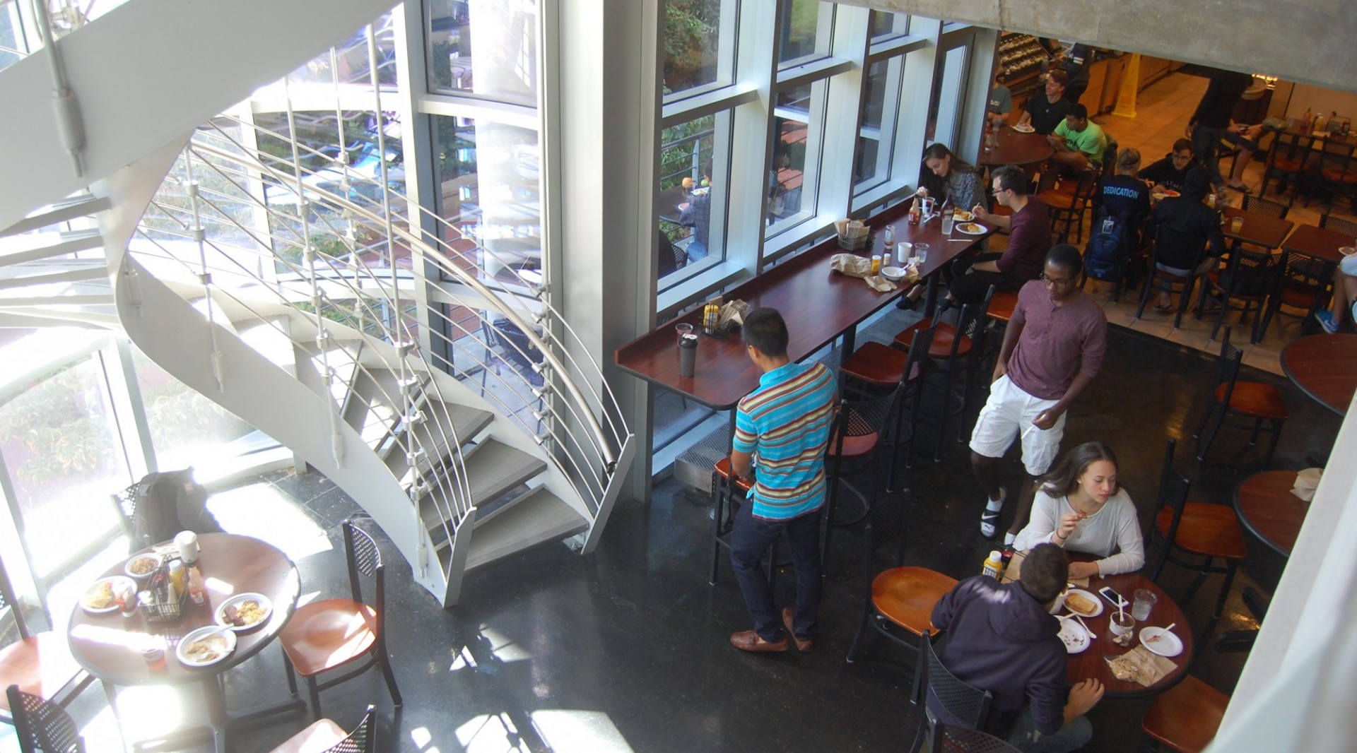 Looking from above at students in Ferris Booth Commons