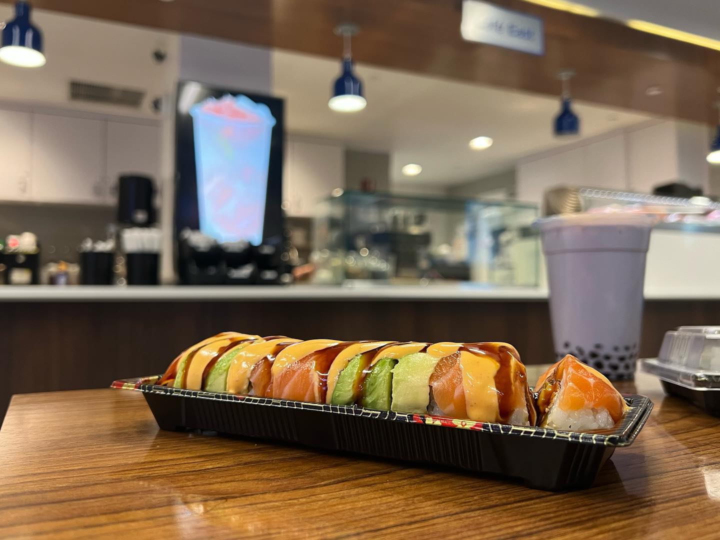 Sushi at counter in Cafe East