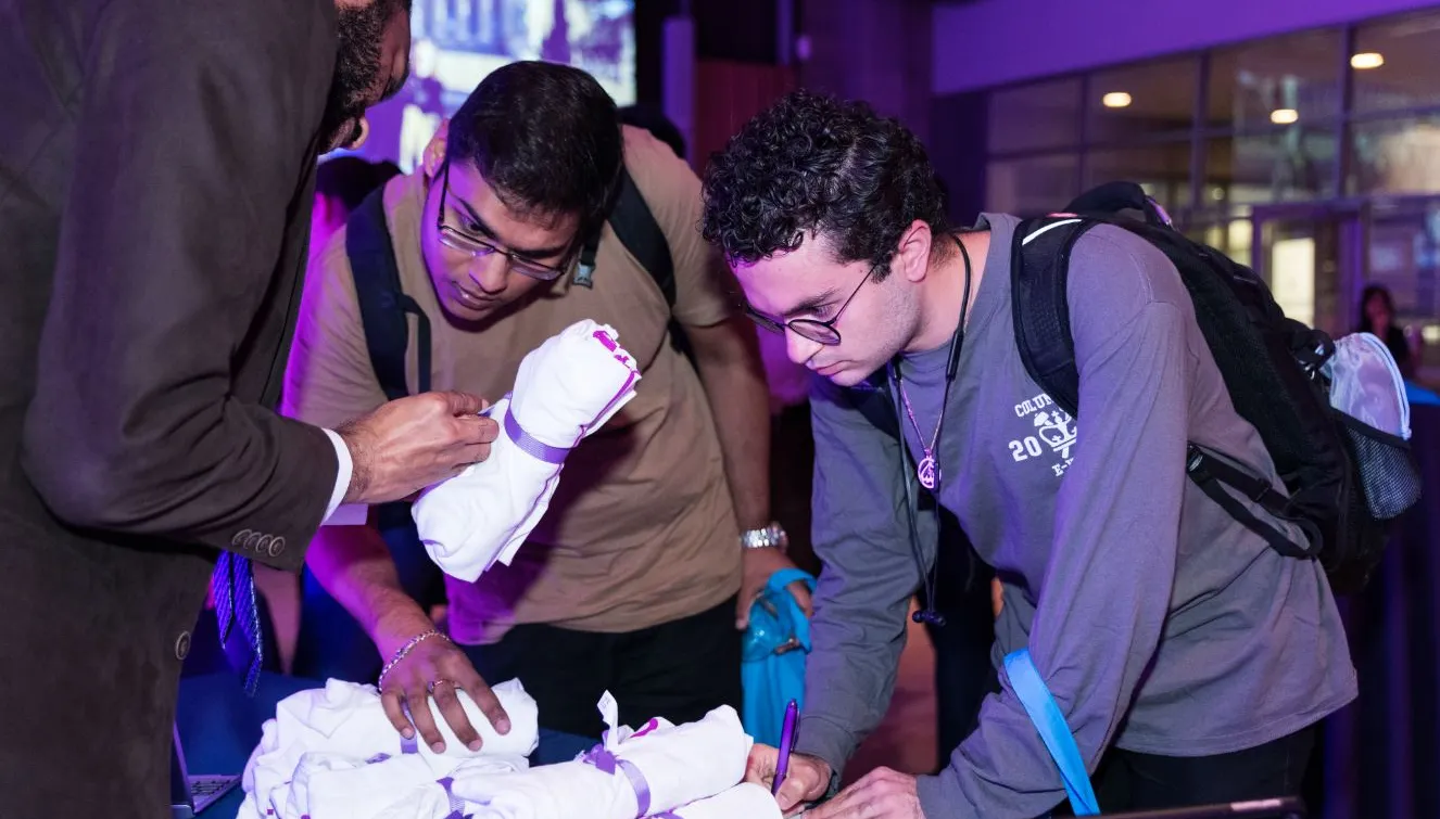 Students sign in at an event in Lerner